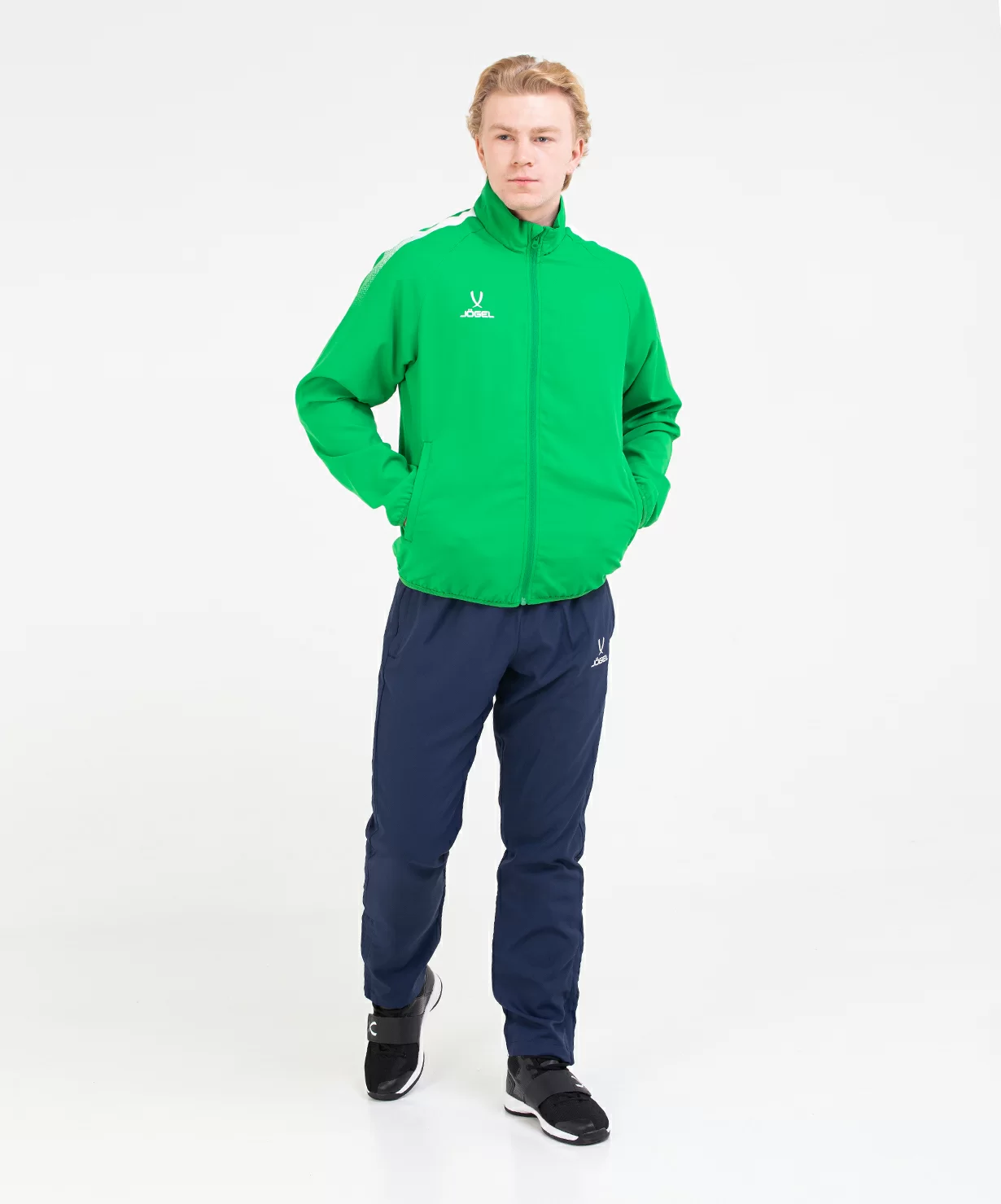 Реальное фото Костюм спортивный CAMP Lined Suit, зеленый/темно-синий от магазина СпортСЕ
